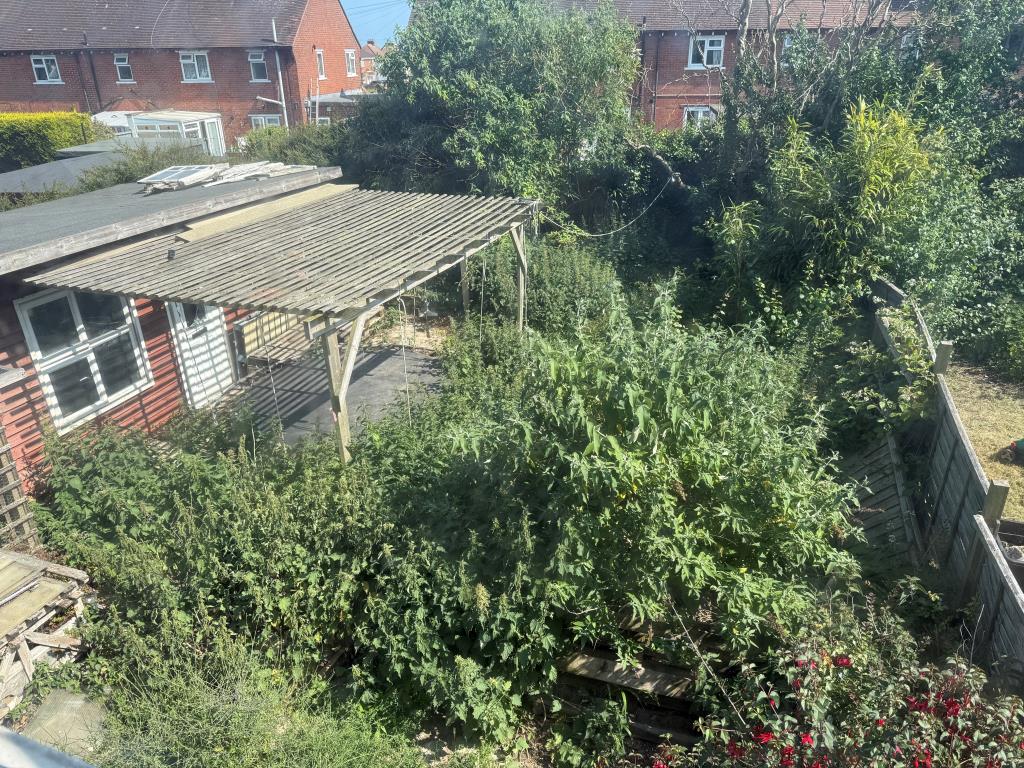 Lot: 112 - END-TERRACE HOUSE FOR IMPROVEMENT - Rear Garden in House in need of Refurbishment
